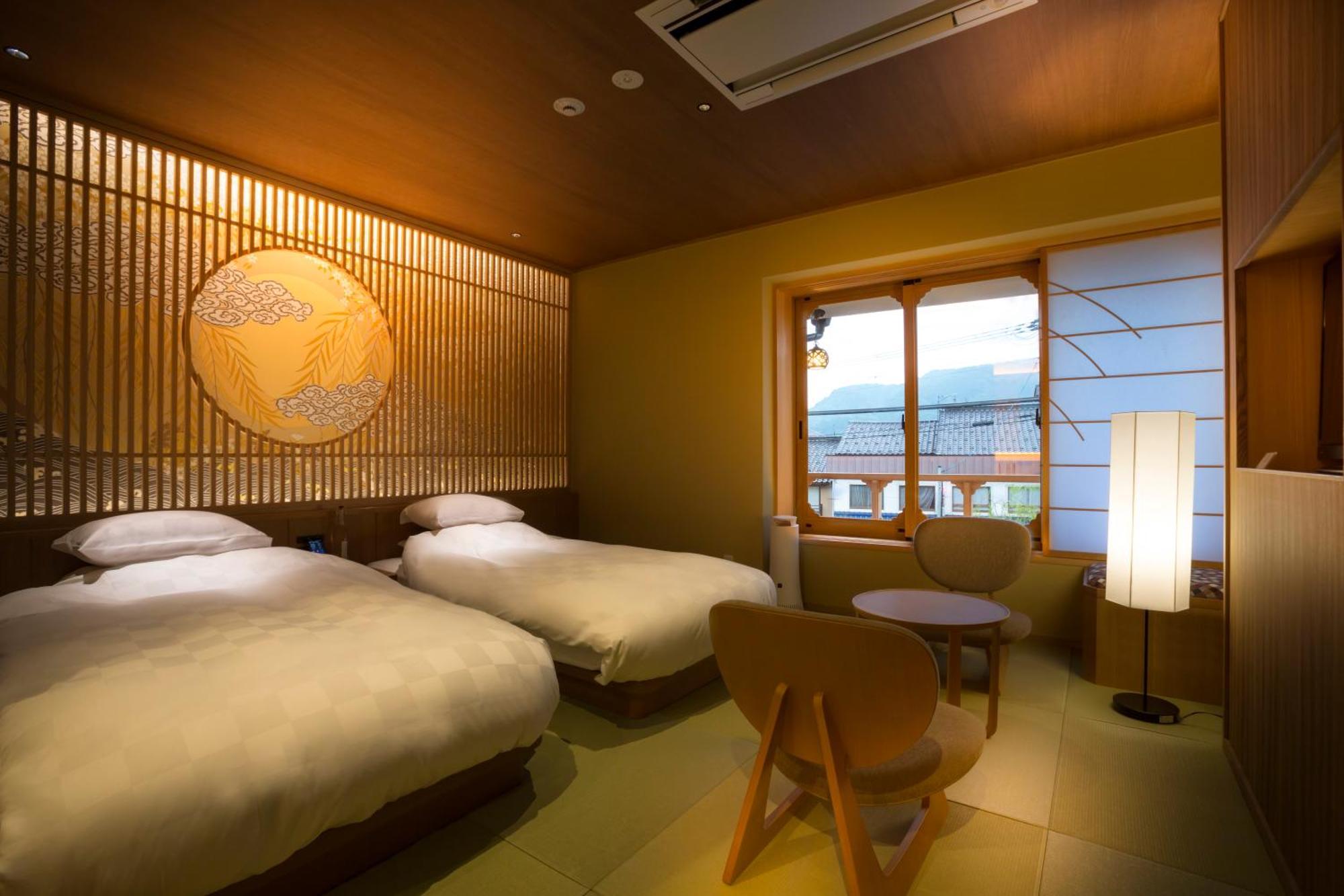 Отель Kinosaki Onsen Tokitotoki Тоёока Номер фото