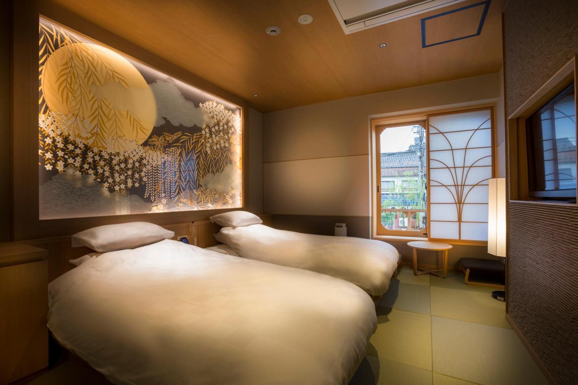 Отель Kinosaki Onsen Tokitotoki Тоёока Номер фото