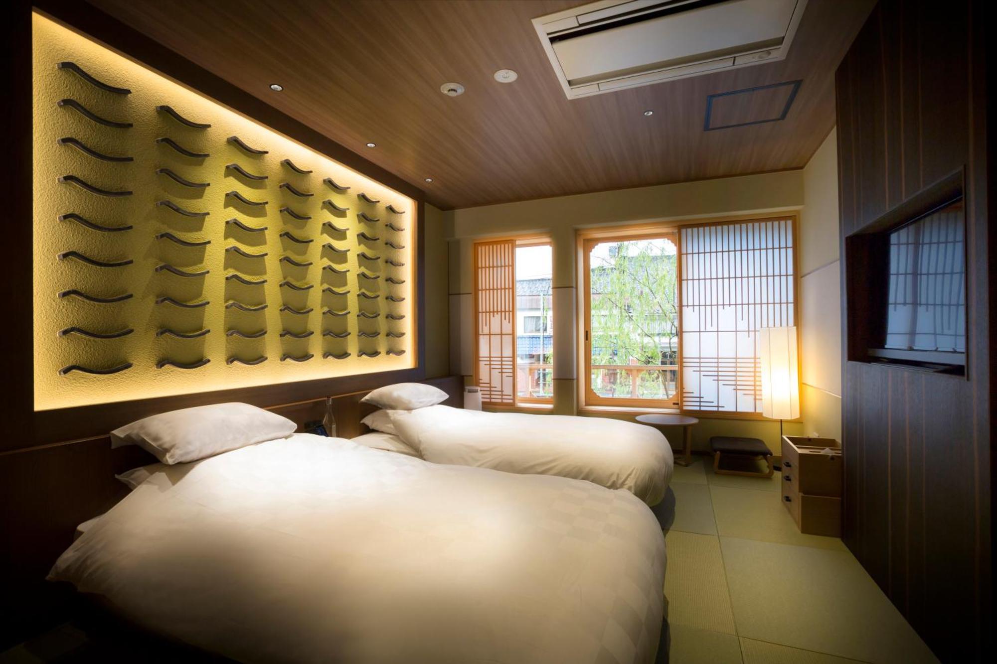 Отель Kinosaki Onsen Tokitotoki Тоёока Номер фото